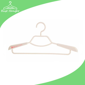 Strong white plastic coat hangers with big shoulders expanding