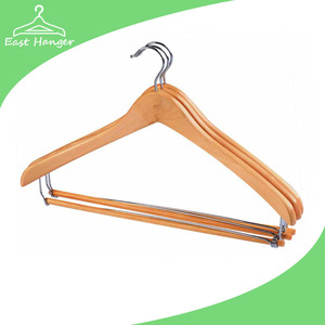 Retail store curved wooden clothes hangers with locking bar