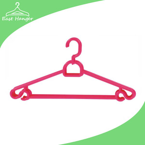 red plastic hanger for clothes with tie slot and racks for strap