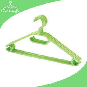 Plastic coat hanger for wet clothes with tie rack and strap rack